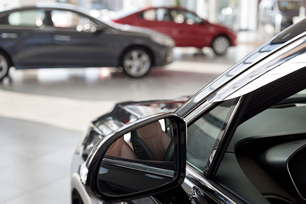 Car wing mirror in a showroom