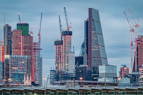 London skyline with construction cranes