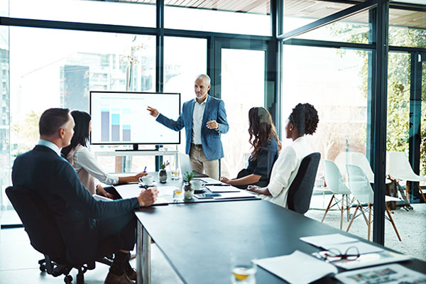 Workers in meeting room