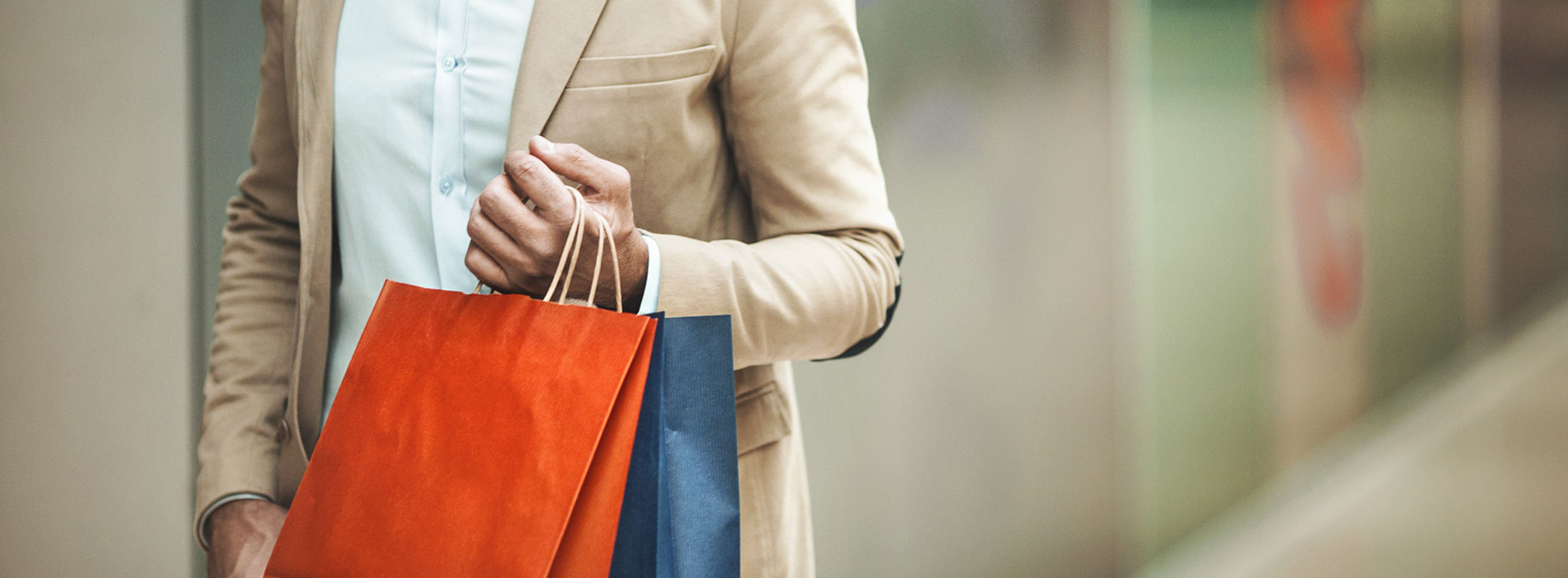 Person carrying shopping bags