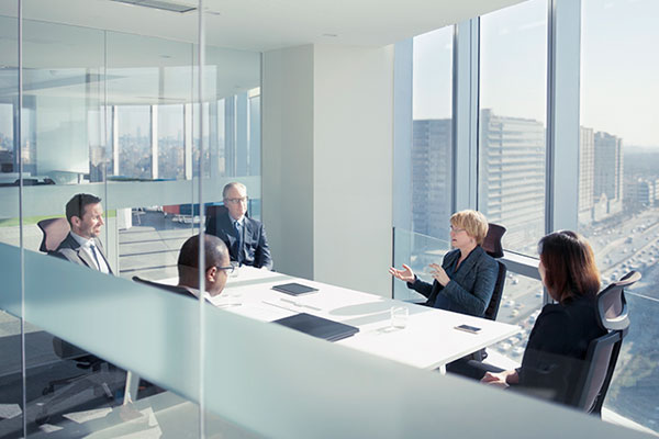 Workers in meeting room