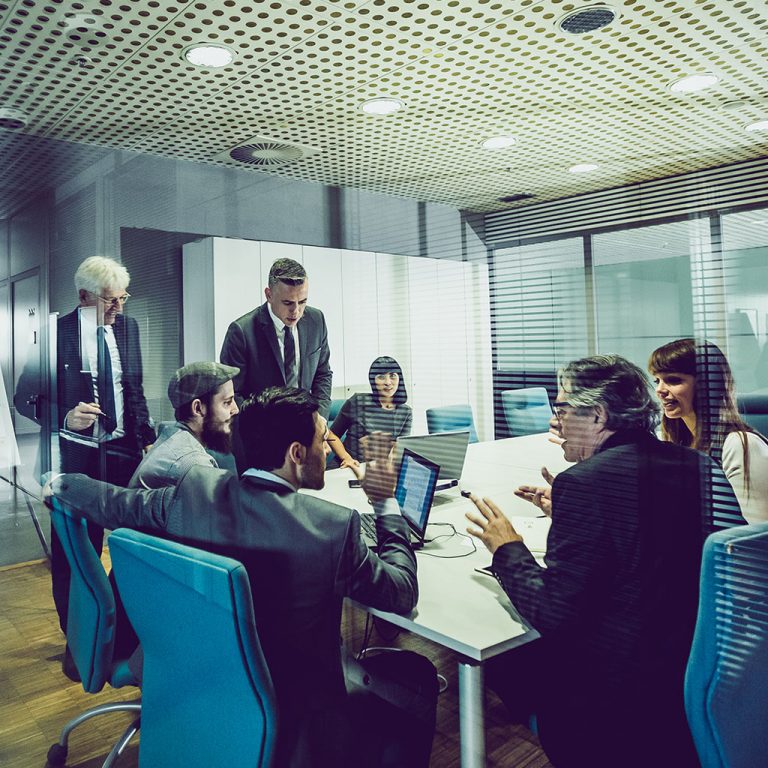 Workers in office meeting