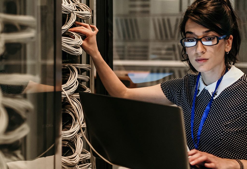 Woman plugging into server