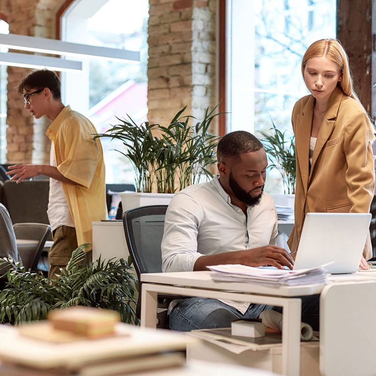 Man and woman in office