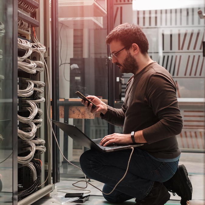 Man fixing server