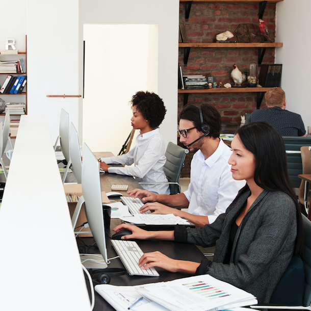 Workers in open plan office