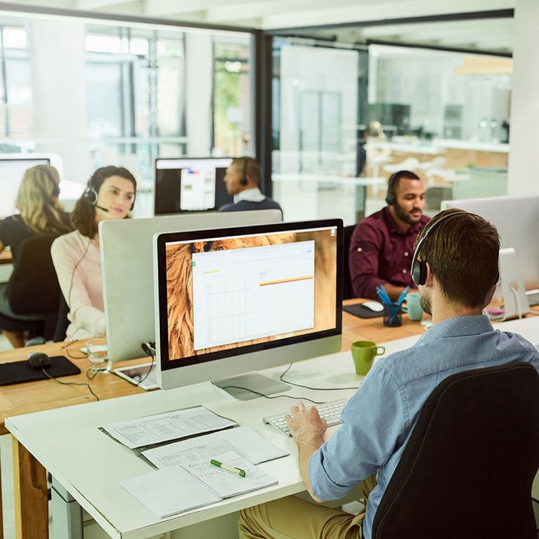 Workers in open plan office